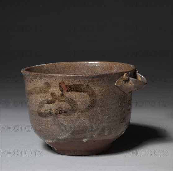 Spouted Bowl with Flower Design: Karatsu Ware, late 16th century. Japan, Momoyama Period (1573-1615). Glazed stoneware with slip decoration; diameter: 17.2 cm (6 3/4 in.); overall: 12.5 x 19.1 cm (4 15/16 x 7 1/2 in.)