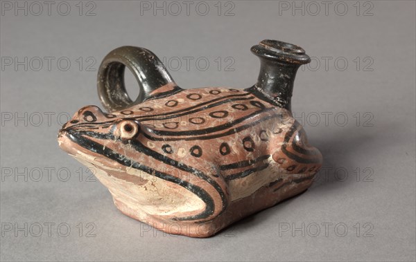 Apulian Frog Guttus, 4th century BC. South Italy, Apulia, 4th Century BC. Pottery with black slip and added white; diameter: 1.5 cm (9/16 in.); overall: 5.8 x 11.2 x 9.1 cm (2 5/16 x 4 7/16 x 3 9/16 in.).