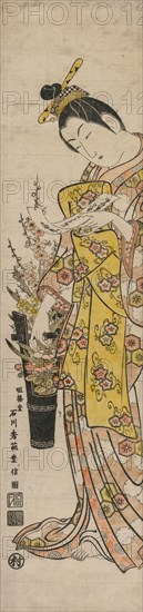 Courtesan Reading a Poem Slip Tied to Flowers in a Vase, mid-1740s. Ishikawa Toyonobu (Japanese, 1711-1785). Color woodblock print; overall: 69.5 x 16.5 cm (27 3/8 x 6 1/2 in.).