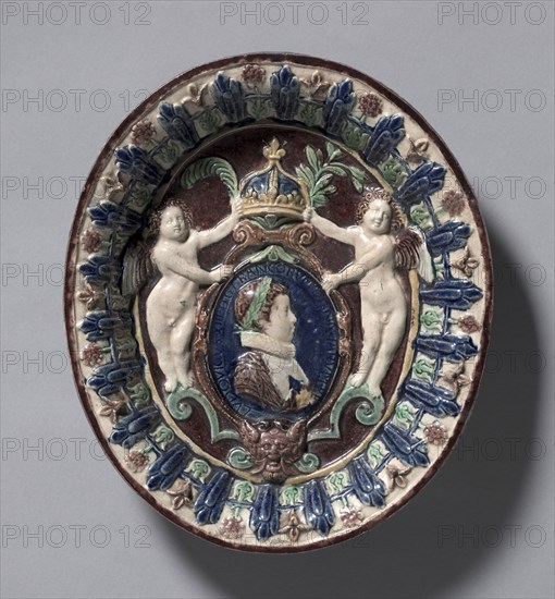 Oval Dish Commemorating the Ascent of the Young Louis XIII to the Throne of France, c. 1610-1615. School of Bernard Palissy (French, 1510-1589). Earthenware; overall: 28 cm (11 in.).