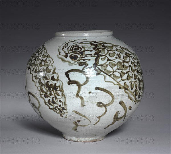Jar with Dragon and Clouds Design, late 1600s. Korea, Joseon dynasty (1392-1910). Porcelain with underglaze iron; diameter of base: 13.7 cm (5 3/8 in.); overall: 34.7 cm (13 11/16 in.).