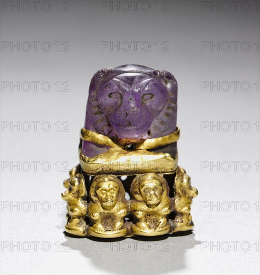 Pendant, c. 700 BC. Sudan, Napatan; lion's head component, Egypt, probably New Kingdom, Late Period, Dynasty 25. Amethyst and gold; overall: 3.5 x 2.9 x 2.7 cm (1 3/8 x 1 1/8 x 1 1/16 in.)