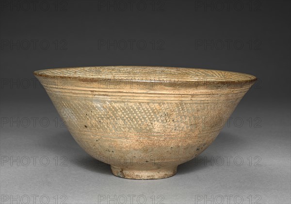 Bowl with Stamped Floral Decoration, 1600s-1700s. Korea, Joseon dynasty (1392-1910). Glazed ceramic; overall: 8.8 cm (3 7/16 in.).