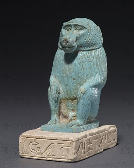 Baboon on a Limestone Base, 380-30 BC. Egypt, Dynasty 30 to Ptolemaic Dynasty. Pale turquoise faience; overall: 10 x 4.5 x 7.5 cm (3 15/16 x 1 3/4 x 2 15/16 in.).
