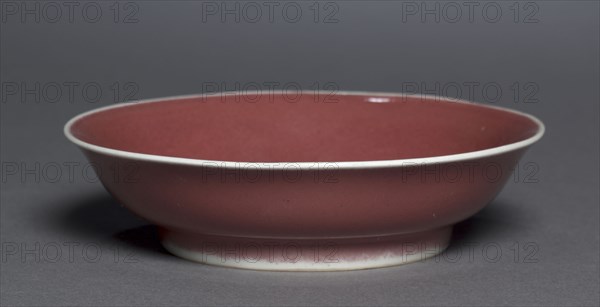 Dish, 1426-1435. China, Jiangxi province, Jingdezhen, Ming dynasty (1368-1644), Xuande mark and period (1426-1435). Porcelain with copper-red glaze; diameter: 15 cm (5 7/8 in.); overall: 3.9 cm (1 9/16 in.).