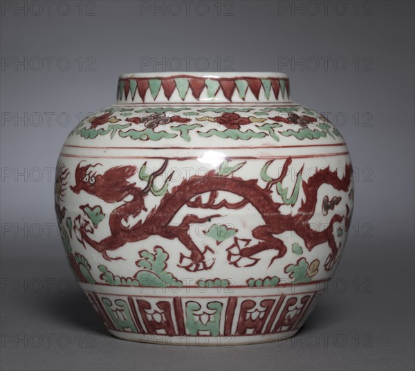 Jar with Dragons Pursuing Flaming Jewels, 1522-1566. China, Jiangxi province, Jingdezhen kilns, Ming dynasty (1368-1644), Jiajing mark and reign (1521-1566). Procelain with wucai (five color) overglaze enamel decoration; diameter: 14.7 cm (5 13/16 in.); overall: 12.9 cm (5 1/16 in.).