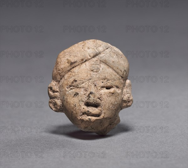 Figurine Head, c. 600-200 BC. Mexico or Central America, Maya(?), Middle Preclassic period. Pottery; overall: 3.1 x 2.6 x 1.9 cm (1 1/4 x 1 x 3/4 in.).