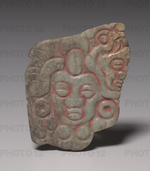 Offering Group: Plaque with Frontal and Profile Faces, 800-1200(?). Mexico, Guerrero(?), San Jerónimo de Juárez, Xochicalco style. Jadeite with albitite; overall: 7.9 x 6.3 x 0.7 cm (3 1/8 x 2 1/2 x 1/4 in.).