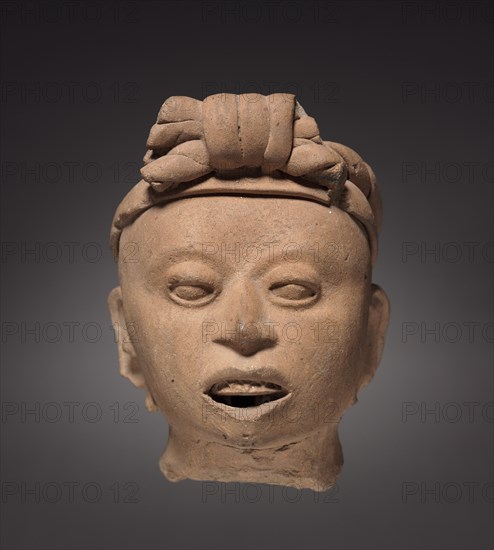 Head Fragment, 900-1200. Mexico, Veracruz. Molded and modeled pottery; overall: 14.5 x 11 x 9.5 cm (5 11/16 x 4 5/16 x 3 3/4 in.).