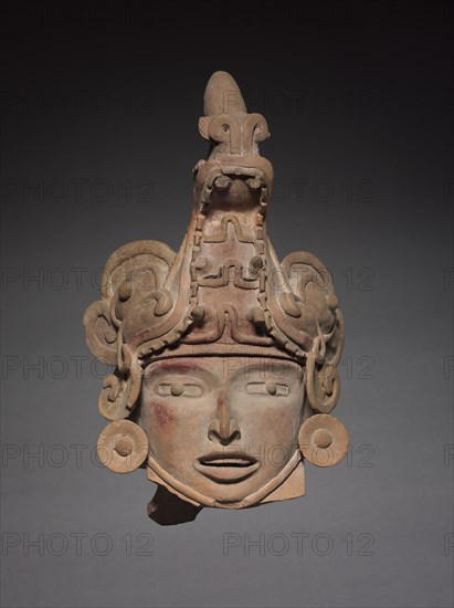 Head with Animal Helmet, c. 600-1000. Mexico, Gulf Coast, San Andrés Tuxtla(?), 7th-11th Century. Earthenware, pigment; overall: 39.1 x 23.4 x 16.5 cm (15 3/8 x 9 3/16 x 6 1/2 in.).
