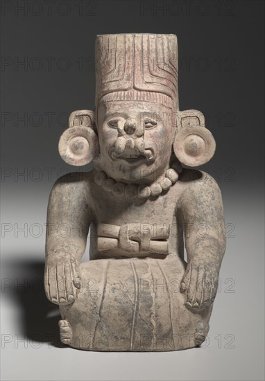 Urn Figure, c. 200-500. Mexico, Oaxaca, Zapotec. Earthenware; overall: 26.1 x 16.3 x 16.3 cm (10 1/4 x 6 7/16 x 6 7/16 in.).