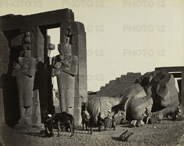 Egypt, Sinai and Jerusalem: A Series of Twenty Photographic Views, with Descriptions by Mrs. Poole and Reginald Stuart Poole: Fallen Statue at the Ramesseum, Thebes, 1857. Francis Frith (British, 1822-1898), William Mackenzie. Albumen print from wet collodion negative; image: 38.3 x 48.2 cm (15 1/16 x 19 in.); matted: 61 x 76.2 cm (24 x 30 in.)