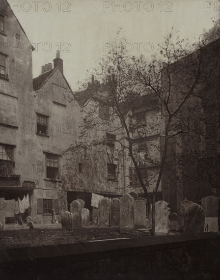 Old London: St. Bartholomews: The Churchyard Looking towards Cloth Fair, 1877. Alfred H. Bool (British), and John Bool (British), album issued by The Society for Photographing the Relics of Old London. Carbon print; image: 23.8 x 18.6 cm (9 3/8 x 7 5/16 in.); matted: 50.8 x 40.6 cm (20 x 16 in.)