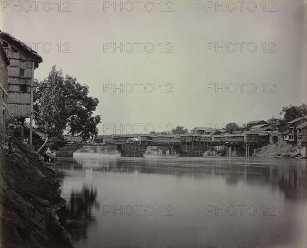 Bridge of Shops, Srinagar, Kashmir, 1864. Samuel Bourne (British, 1834-1912). Albumen print from wet collodion negative; image: 23.6 x 29.1 cm (9 5/16 x 11 7/16 in.); matted: 40.6 x 50.8 cm (16 x 20 in.)
