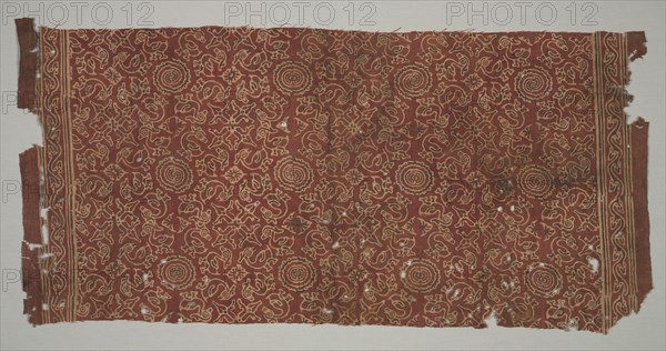 Fragment with geese circling lotus medallions, 1400s. India. Plain weave: cotton, stamped mordant resist and dyed; overall: 90.2 x 46.5 cm (35 1/2 x 18 5/16 in.).