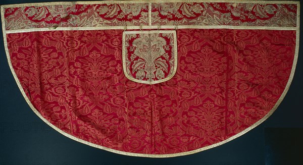 Priest's Red Cope, Orphrey and Hood, late 1500s - early 1600s. France and Italy, Orphrey and hood: France, Lyon, Regency period, 1715-1725; Cope: Italy,  late 16th - early 17th century. Cope: damask weave, silk; Orphrey and hood: brocade, silk and silver; overall: 145.4 x 275.4 cm (57 1/4 x 108 7/16 in.)