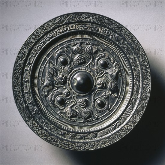 Mirror with Four Nipples and Eight Animals, 300. China, Western Jin dynasty (265-316). Bronze; diameter: 19.6 cm (7 11/16 in.); overall: 1.3 cm (1/2 in.); rim: 1 cm (3/8 in.).