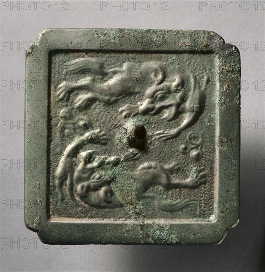 Cruciform Mirror with Two Lions, late 8th-early 9th century. China, Tang dynasty (618-907). Bronze; overall: 0.7 x 10.5 cm (1/4 x 4 1/8 in.); rim: 0.4 cm (3/16 in.).
