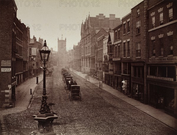 Bridge Street, Chester, 1865. Augustus Kelham (British, 1819-1897). Albumen print from wet collodion negative; image: 16.7 x 21.7 cm (6 9/16 x 8 9/16 in.); matted: 35.6 x 45.7 cm (14 x 18 in.)