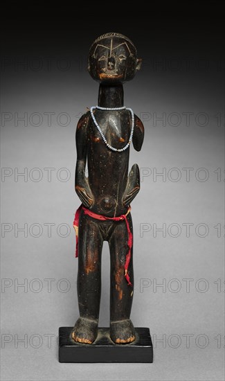 Female Figure, 1900s. Democratic Republic of the Congo, Tabwa, late 19th or early 20th century. Wood; overall: 36.2 x 7.8 x 9 cm (14 1/4 x 3 1/16 x 3 9/16 in.)