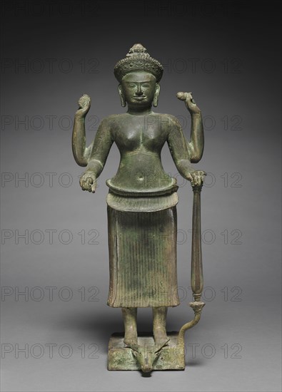 Durga as the Slayer of the Buffalo Demon, 900s. Cambodia, Koh Ker, 10th century. Bronze; overall: 52 x 18.4 x 12.5 cm (20 1/2 x 7 1/4 x 4 15/16 in.); without tang: 44.8 cm (17 5/8 in.).