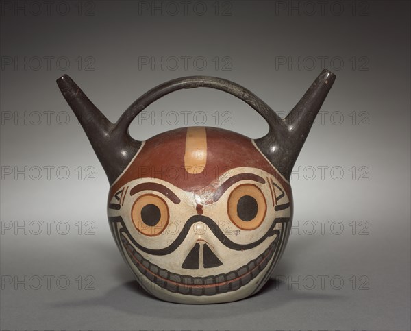Skull Vessel, 500-900. Wari (Pachacamac) style, Middle Horizon, Epoch 2. Earthenware with colored slips; overall: 14.5 x 17.8 x 12.6 cm (5 11/16 x 7 x 4 15/16 in.).