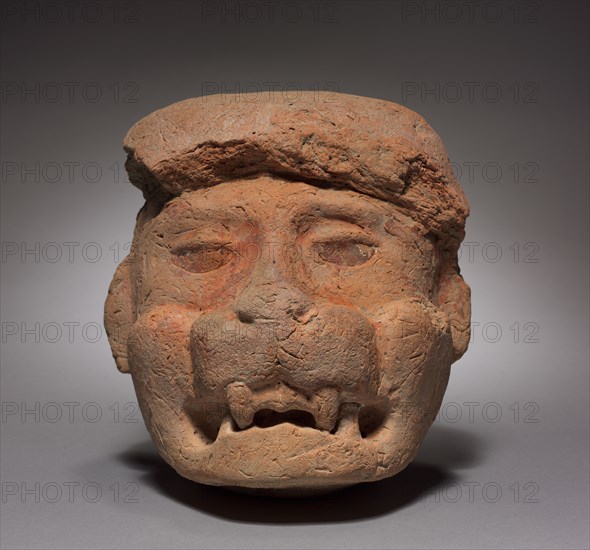Architectural Sculpture Fragment, c. 700-1000. Mexico, Oaxaca, Zapotec. Unfired clay, covered with painted stucco; overall: 22.8 x 12.5 x 13 cm (9 x 4 15/16 x 5 1/8 in.).
