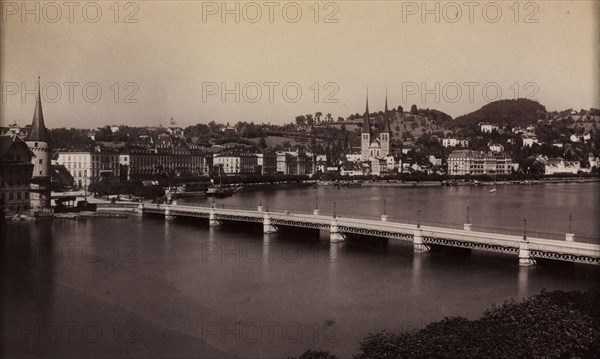 Untitled (Bridge with Town in Distance), 19th century. Unidentified Photographer. Albumen print from wet collodion negative; paper: 9.6 x 15.5 cm (3 3/4 x 6 1/8 in.)