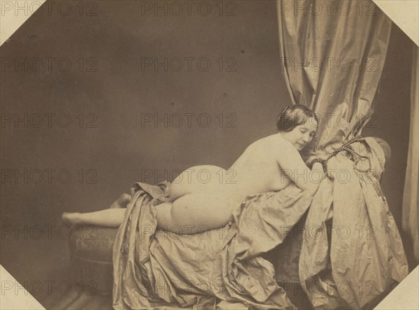 Academic Nude, Reclining on a Sofa, c. 1855. Auguste Belloc (French, 1801-c. 1868). Salted paper print from wet collodion negative; image: 15.8 x 21.2 cm (6 1/4 x 8 3/8 in.); matted: 40.6 x 50.8 cm (16 x 20 in.)