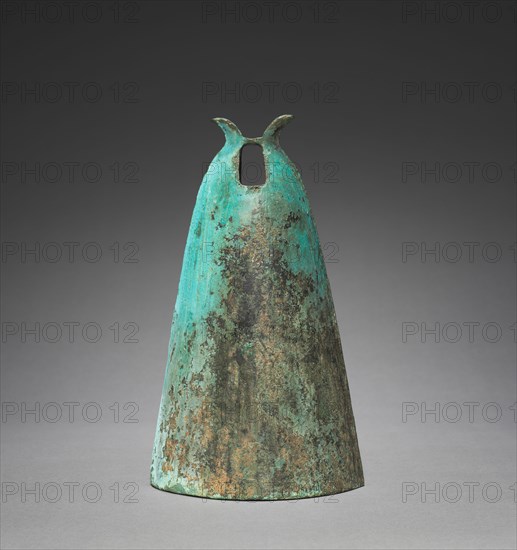 Bell with Diamond-Shaped Insignia, 300s-100s BC. China, along the southern borders, Eastern Zhou dynasty (771-256 BC) - Han dynasty (202 BC-AD 220). Bronze; overall: 24.1 cm (9 1/2 in.).
