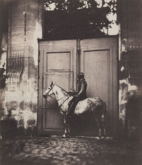 Black Horseman in Front of a Doorway, c. 1855. Unidentified Photographer. Salt print from wet collodion negative; image: 15.5 x 13.5 cm (6 1/8 x 5 5/16 in.); mounted: 47 x 30.6 cm (18 1/2 x 12 1/16 in.); matted: 50.8 x 40.6 cm (20 x 16 in.)