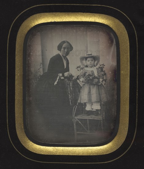 Child Standing on a Chair Holding Flowers, with Mother, c. 1855. Unidentified Photographer. Daguerreotype, quarter-plate; image: 9.2 x 7.1 cm (3 5/8 x 2 13/16 in.); framed: 15.4 x 12.7 cm (6 1/16 x 5 in.); matted: 45.7 x 35.6 cm (18 x 14 in.)