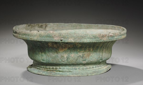 Bronze Volute Krater Base, late 6th Century BC. Greece, Laconia, late 6th Century BC. Bronze; overall: 5.1 x 2.5 cm (2 x 1 in.).