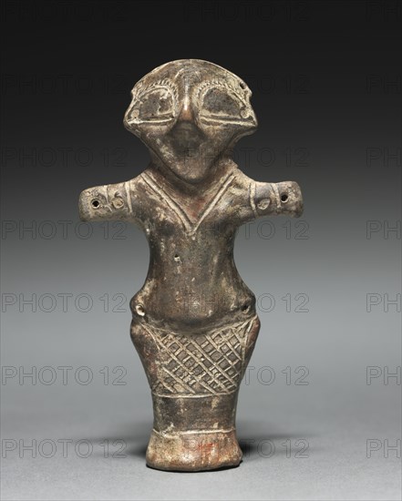 Vinca Idol, 4th millennium BC. Serbia, Vinça culture, Neolithic Era. Fired clay with paint; overall: 9.5 cm (3 3/4 in.).