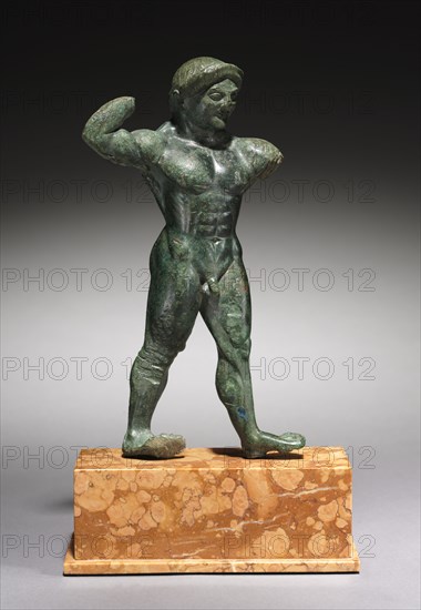 Statuette of an Athlete, 510-500 BC. Greece, Peloponnesus, late archaic - early classical period. Bronze (solid cast); overall: 21.5 cm (8 7/16 in.).