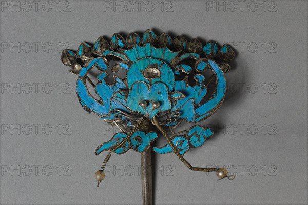 Headdress Ornament, 1700s or 1800s. China, Qing dynasty (1644-1911). Made from a copper-silver alloy, some with gilding, and decorated with kingfisher feathers and glass beads; overall: 8.1 x 5.1 cm (3 3/16 x 2 in.).