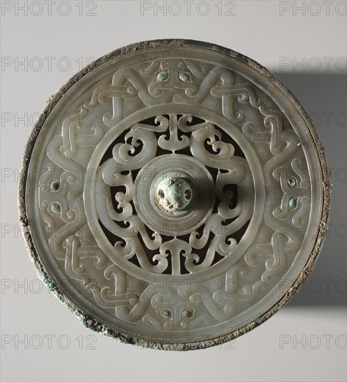 Mirror with Jade Disk Inset, late Warring States (475-221 BC) to early Western Han (206 BC-9 AD). China, Eastern Zhou dynasty (771-256 BC), late Warring States period (475-221 BC) - early Western Han dynasty (202 BC-AD 9). Bronze with nephrite and turquoise; diameter: 15.3 cm (6 in.)