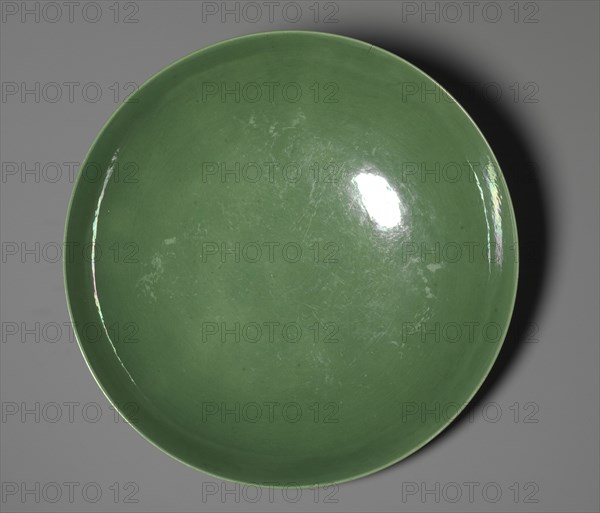 Dish with Green Glaze and Carved Floral Designs, 1736-1795. China, Qing dynasty (1644-1911), Qianlong mark and reign (1735-1795). Glazed porcelain; diameter: 27.7 cm (10 7/8 in.); overall: 5.3 cm (2 1/16 in.).