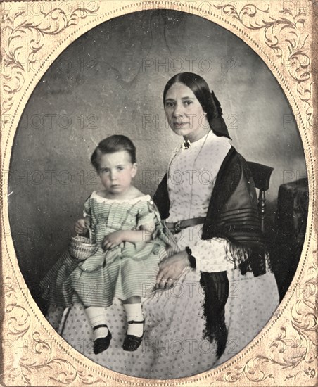 Mother and Child, c. 1860. Unidentified Photographer. Ambrotype, tinted, sixth plate; case: 9.6 x 8.3 cm (3 3/4 x 3 1/4 in.); overall: 8.3 x 7 cm (3 1/4 x 2 3/4 in.); matted: 61 x 48.3 cm (24 x 19 in.)