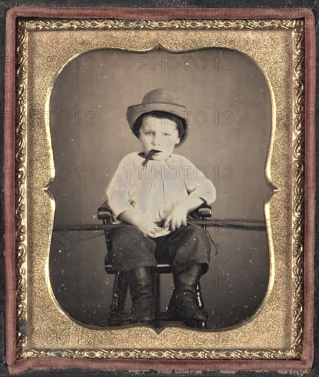 Boy with Cigar, c.1855. Unidentified Photographer. Daguerreotype, tinted, sixth plate; image: 8.3 x 7 cm (3 1/4 x 2 3/4 in.); case: 9.3 x 8 cm (3 11/16 x 3 1/8 in.); matted: 61 x 48.3 cm (24 x 19 in.)