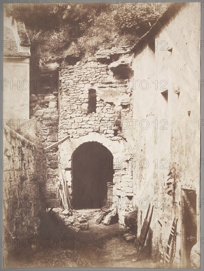 Behind the Troglodyte Farm, c. 1853. Henri Le Secq (French, 1818-1882). Salted paper print from waxed paper negative; image: 50.9 x 31.1 cm (20 1/16 x 12 1/4 in.); matted: 76.2 x 61 cm (30 x 24 in.)