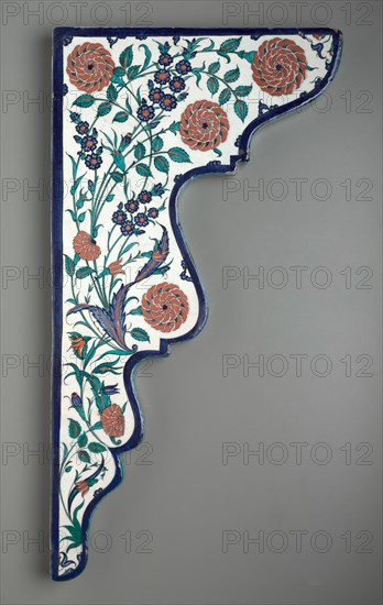 Tile Spandrel with Floral Sprays, c. 1570-1575. Turkey, Iznik, Ottoman Period, 16th century. Fritware with red slip and underglaze-painted design; overall: 76 x 29.9 x 2.5 cm (29 15/16 x 11 3/4 x 1 in.).