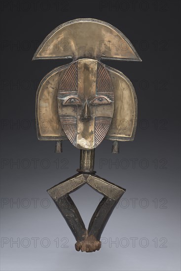 Reliquary Guardian Figure, probably 1800s. Equatorial Africa, Gabon, Kota, probably 19th century. Wood, metal; overall: 61 x 27.5 x 3 cm (24 x 10 13/16 x 1 3/16 in.)