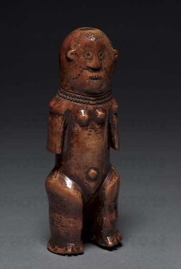 Figurine, probably 1800s. Central Africa, Democratic Republic of the Congo, Lega, probably 19th century. Ivory; overall: 17.5 cm (6 7/8 in.)
