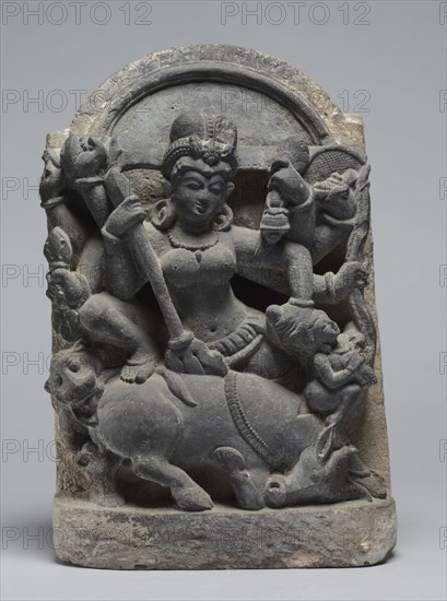 Durga Slaying the Buffalo Demon Mahisha, 800s. India, Badra, Central Northeastern style, early Medieval, 9th century. Stone; overall: 39.5 x 16.1 x 12 cm (15 9/16 x 6 5/16 x 4 3/4 in.).