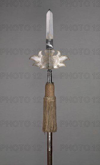 Parade Partisan (from the Bodyguard of August Wilhelm, Duke of Brunswick- Wolfenbüttel [1662-1731]), 1718. Germany, 18th century. Blued, etched and gilded steel, wooden haft with orginal steel base spike, silk tassel with alternating blue and gold bands; overall: 258.5 cm (101 3/4 in.)