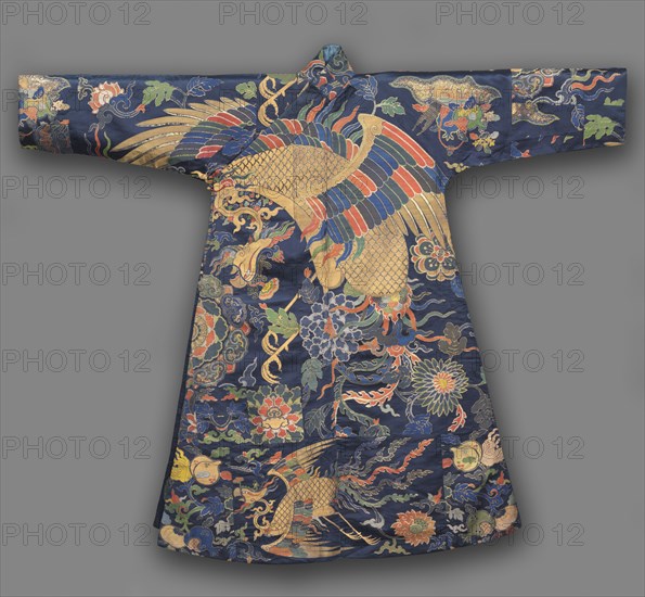 Tibetan Man's Robe, Chuba, late 1600s. China, Qing dynasty (1644-1911), Kangxi period (1662-1772). Silk, gilt-metal thread of two kinds: satin weave with supplementary weft patterning; width across shoulders: 189.9 cm (74 3/4 in.); length back of neck to hem: 152.4 cm (60 in.)
