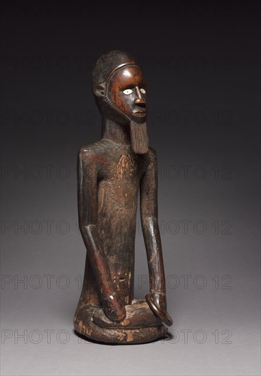 Male Figure, late 1800s-early 1900s. Central Africa, Republic of the Congo, Beembe people. Wood, ceramic, copper alloy, iron alloy; overall: 47.5 x 14.8 x 16.3 cm (18 11/16 x 5 13/16 x 6 7/16 in.)