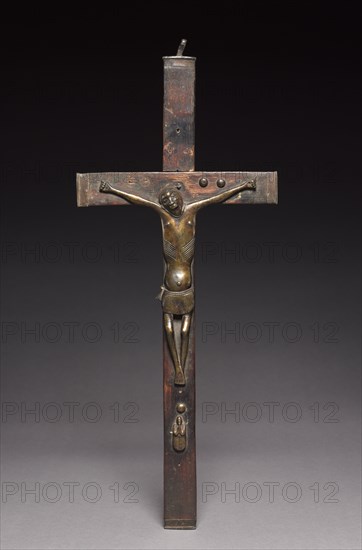 Crucifix, late 1800s-early 1900s. Central Africa, Democratic Republic of the Congo or Cabinda, Kongo people. Brass, iron alloy, wood; overall: 44.7 x 22.2 x 3.2 cm (17 5/8 x 8 3/4 x 1 1/4 in.)