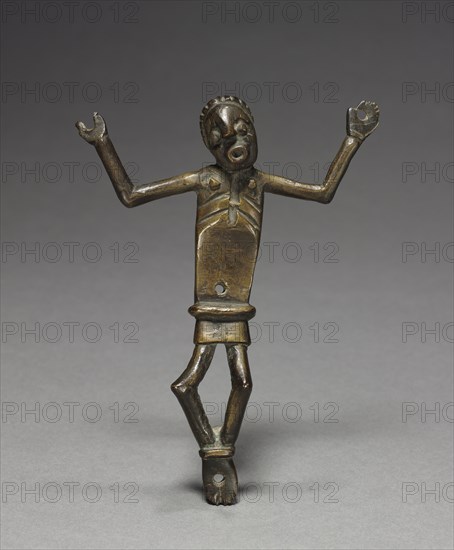 Corpus (Crucified Christ), late 1800s-early 1900s. Central Africa, Democratic Republic of the Congo or Cabinda, Kongo people. Brass; overall: 16.5 x 12.5 x 2.5 cm (6 1/2 x 4 15/16 x 1 in.)